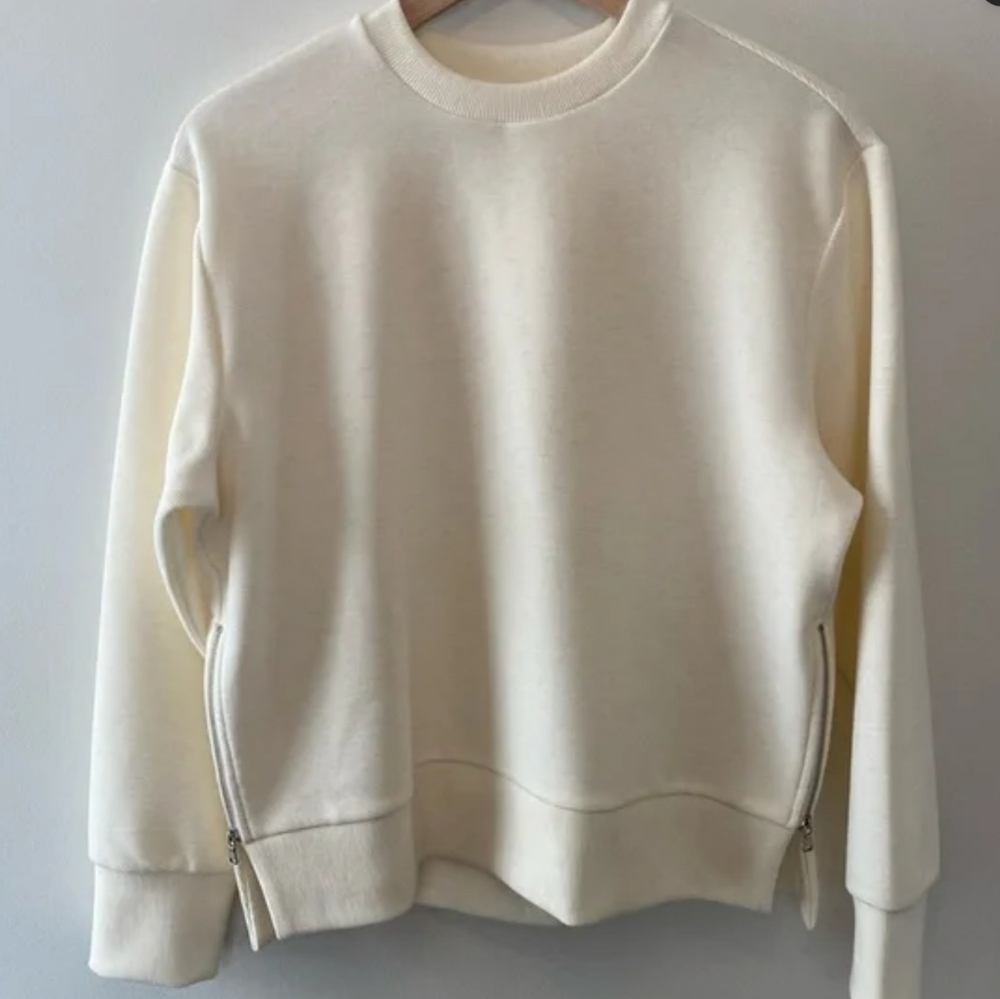 Calia Elevate Ottoman Side Zip Sweatshirt by Carrie Underwood, cream color, XL.